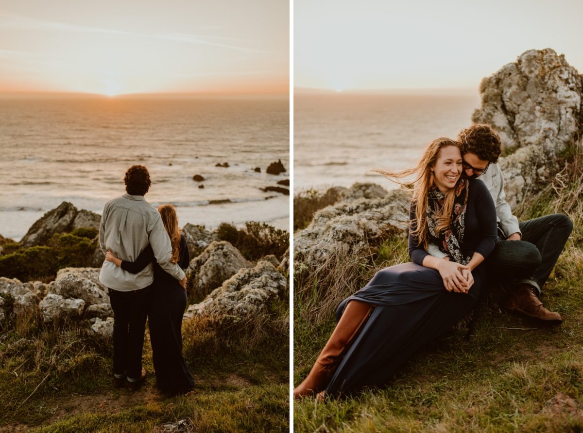 A couple embrace and sit on the Sonoma coast as they watch the sunset.